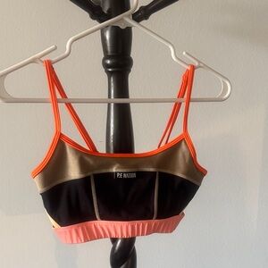 P.E Nation Women's Sports Bra - Black, Gold, and Pink